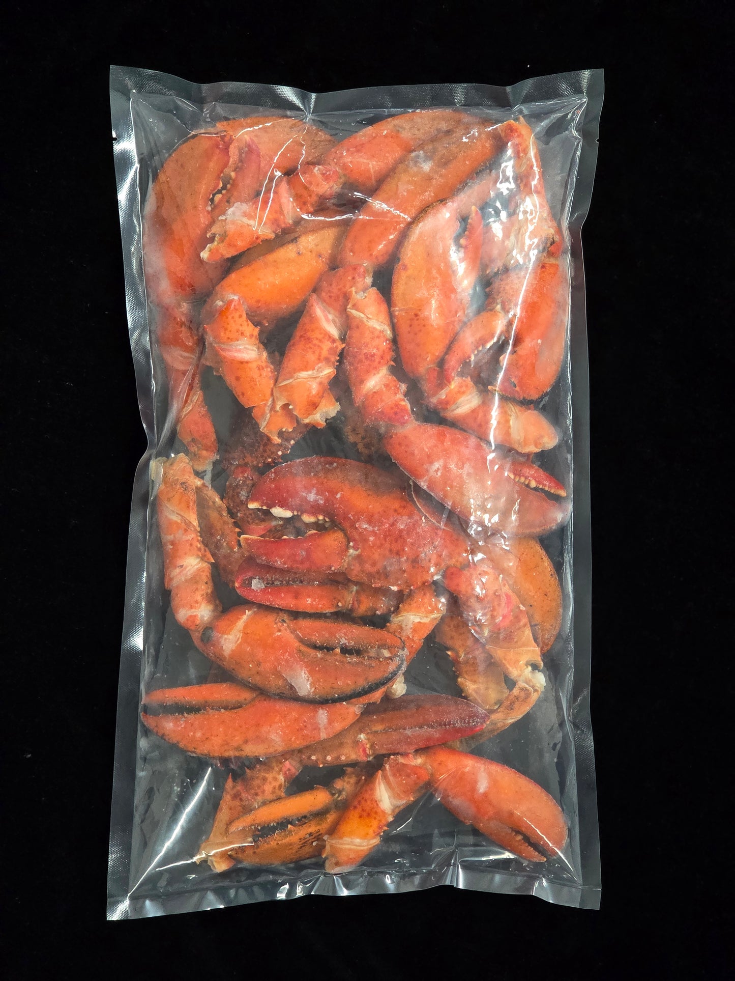 Cooked whole lobster claws and knuckles, scored and frozen - 3 lb