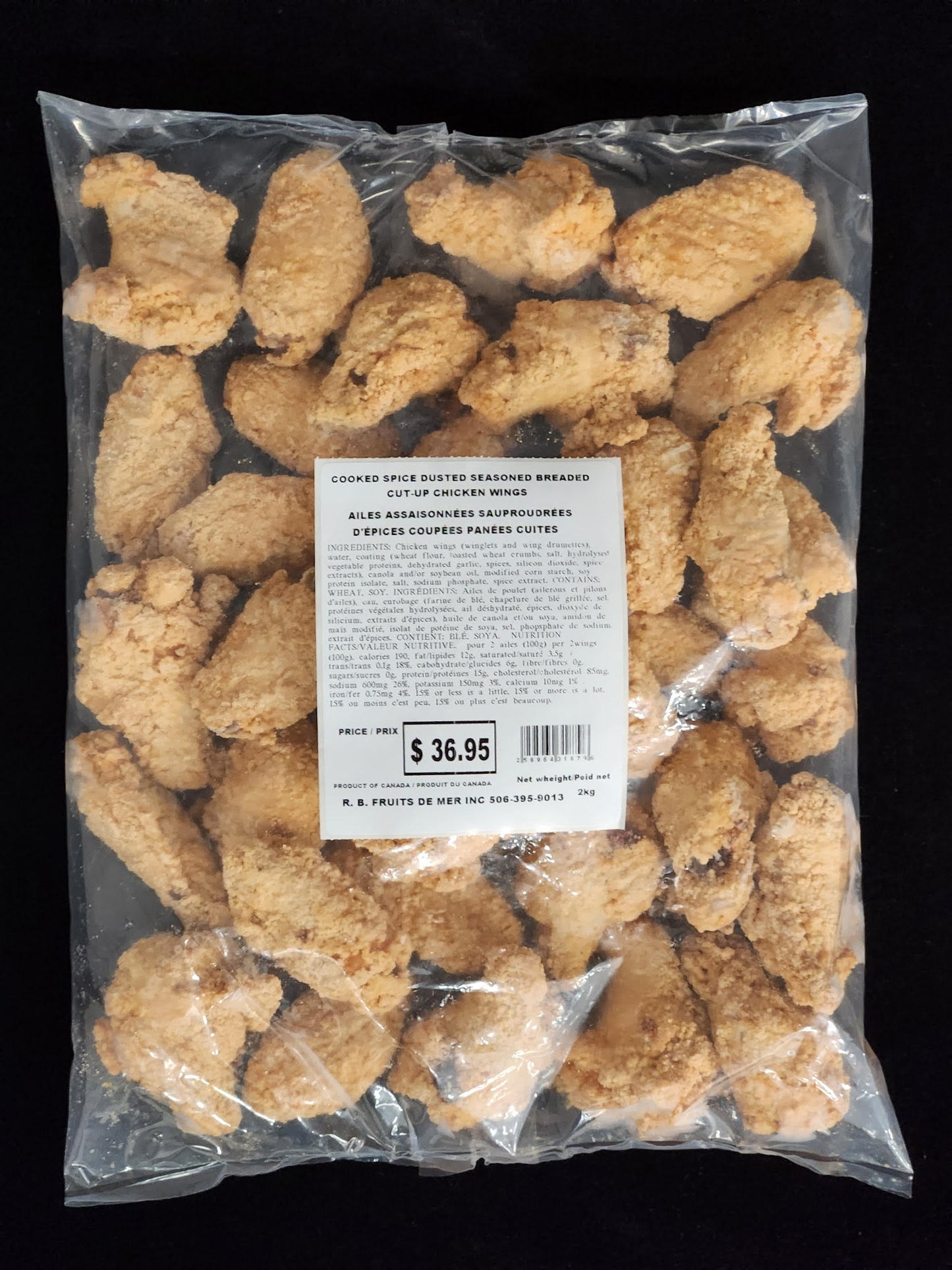 Ailes de poulet assaisonnées saupoudrées d'épices coupées panées cuites - 2kg